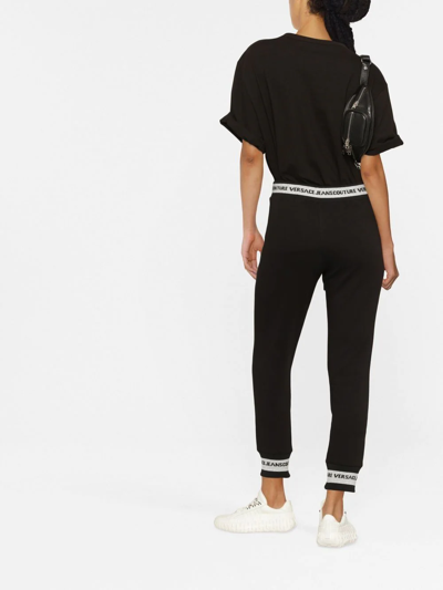 Versace Jeans Couture V Emblem Embroidered Track Pants In Schwarz
