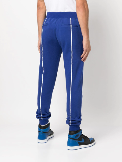 Shop Haculla Fang Lips-print Track Pants In Blue