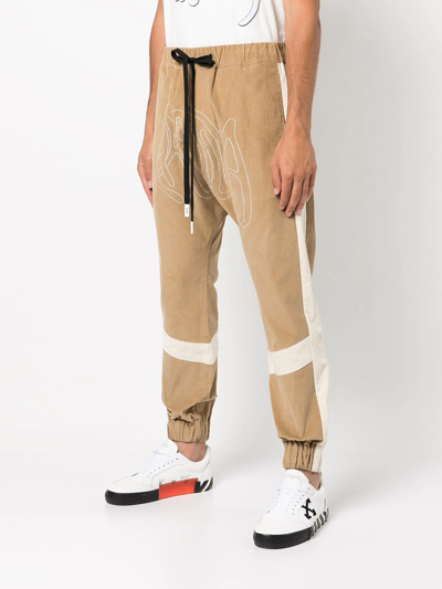 Shop Haculla Embroidered-logo Ribbed Drop-crotch Pants In Brown