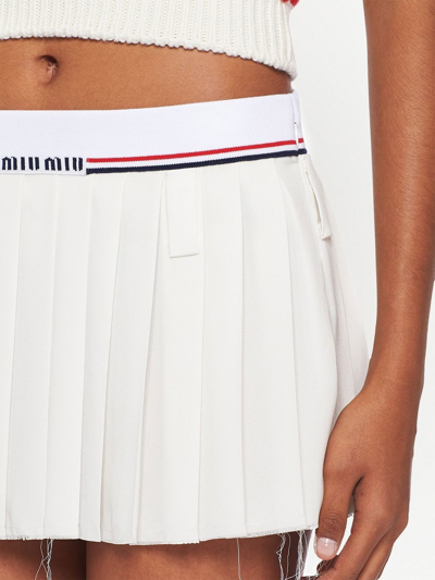 Shop Miu Miu Sablé Pleated Mini Skirt In White