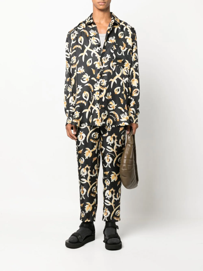 Nanushka Black Jain Floral Print Silk Track Pants In Black