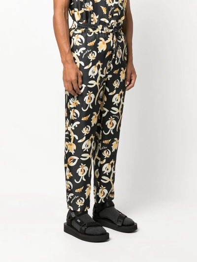 Nanushka Black Jain Floral Print Silk Track Pants In Black