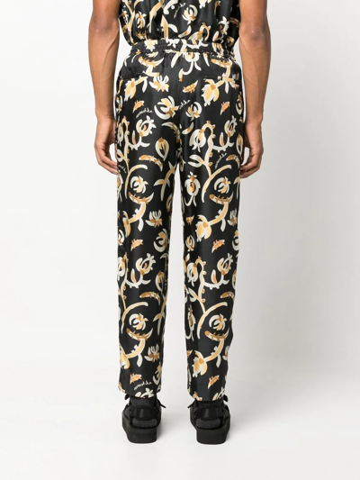 Nanushka Black Jain Floral Print Silk Track Pants In Black