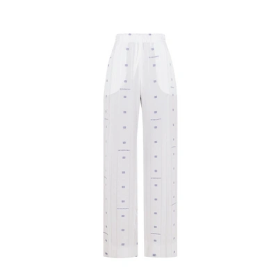 Shop Givenchy Flowing Trousers With Logo In White