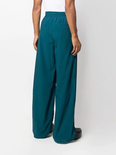 Shop Off-white Elasticated-waist Wide-leg Trousers In Blau