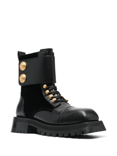 Shop Balmain Embossed-button Detail Ankle Boots In Black