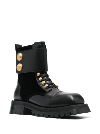 Balmain Embossed-button Detail Ankle Boots In Black