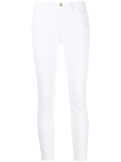 Shop Frame Le High Slim-fit Jeans In White