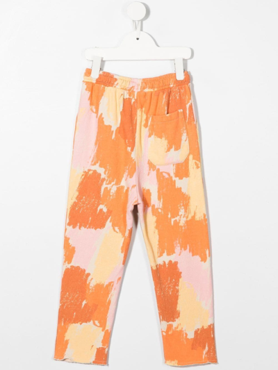 Shop Bobo Choses Patterned Elasticated Track Pants In Orange
