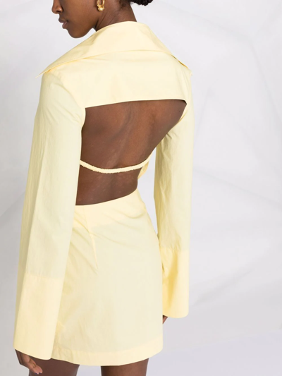 Shop Nanushka Open-back Mini Wrap Dress In Yellow
