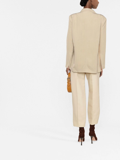 Shop Jacquemus Baccala Asymmetric Cropped Blazer In Nude