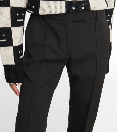 Shop Acne Studios High-rise Pleated Pants In Black