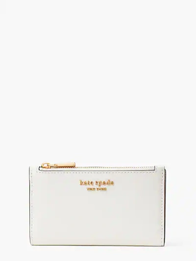 Shop Kate Spade Morgan Small Slim Bifold Wallet In Halo White