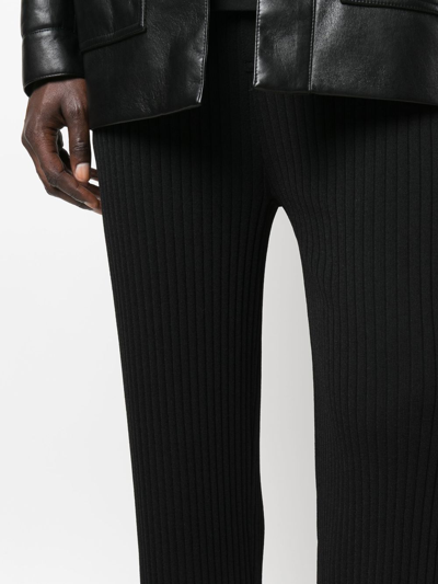 Shop Nanushka Ribbed-knit Straight-leg Trousers In Black