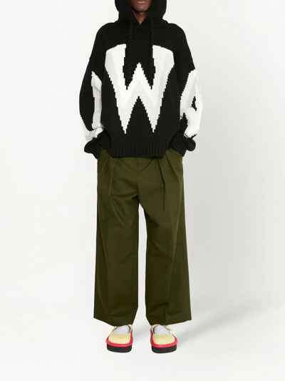 Shop Jw Anderson Pressed-crease Tailored Trousers In Green