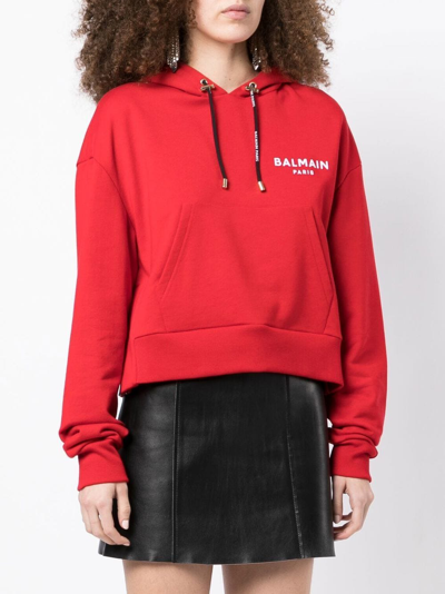 Shop Balmain Flocked-logo Cropped Hoodie In Red