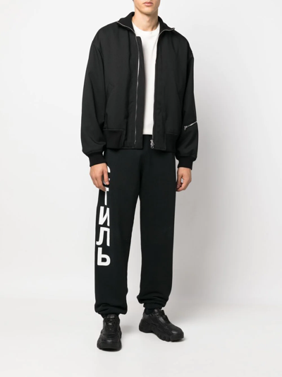 Shop Heron Preston Ctnmb Logo-print Track-pants In Schwarz