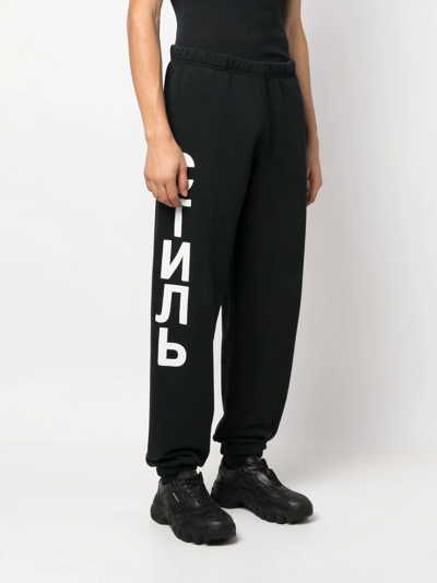 Shop Heron Preston Ctnmb Logo-print Track-pants In Schwarz