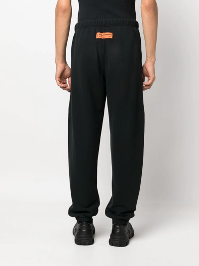 Shop Heron Preston Ctnmb Logo-print Track-pants In Schwarz