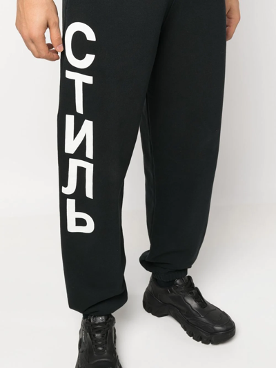 Shop Heron Preston Ctnmb Logo-print Track-pants In Schwarz