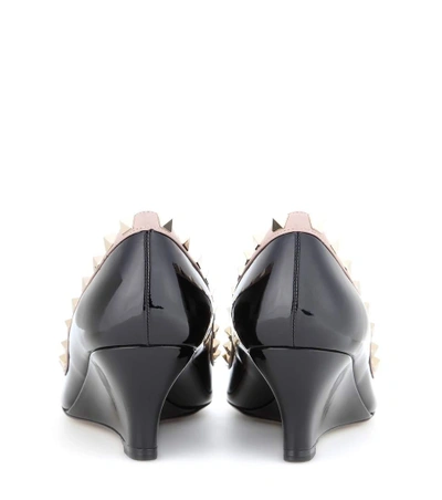 Shop Valentino Rockstud Patent Leather Wedges In Eero