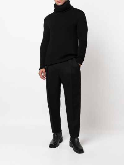 Shop Saint Laurent Pinstripe Straight-leg Trousers In Schwarz