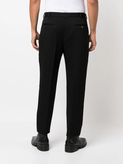 Shop Saint Laurent Pinstripe Straight-leg Trousers In Schwarz