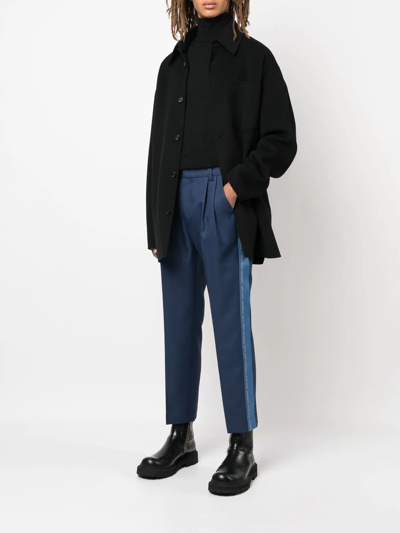 Shop Viktor & Rolf Embroidered-logo Cropped Trousers In Blue