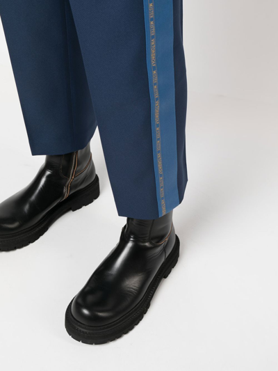 Viktor & Rolf Embroidered-logo Cropped Trousers In Blue