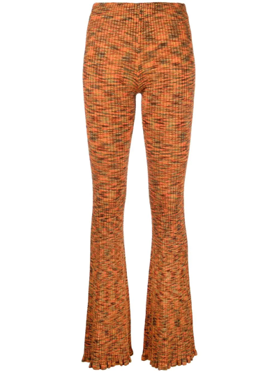 Shop Acne Studios Bootcut Ribbed-knit Trousers In Orange