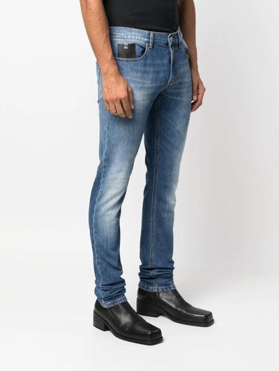 Shop Alyx Slim-cut Denim Jeans In Blue