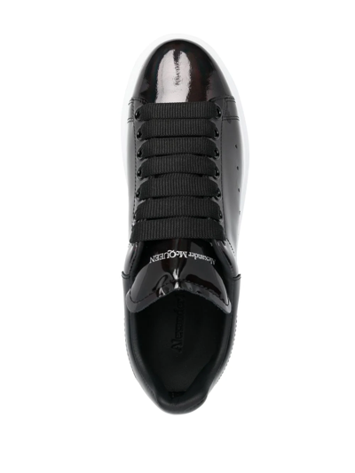 Shop Alexander Mcqueen Patent-leather Low-top Sneakers In Black