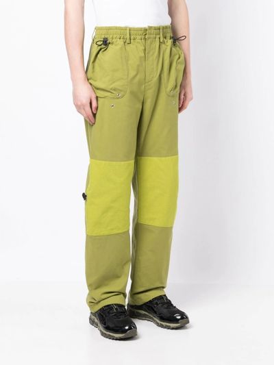 A-cold-wall* Logo-print Panelled Relaxed-fit Cotton-canvas Ripstop Trousers In Green