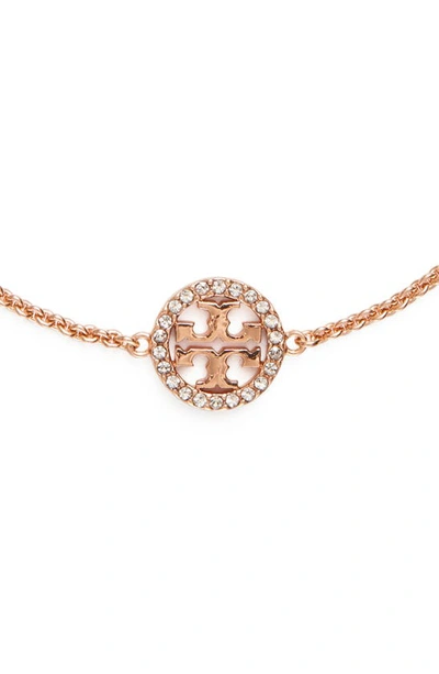 Shop Tory Burch Miller Pavé Charm Bracelet In Rose Gold / Crystal