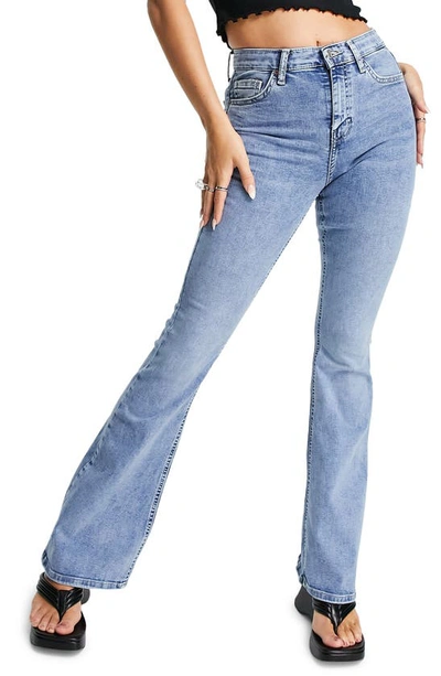 Shop Topshop Jamie Flare Leg Jeans In Mid Blue