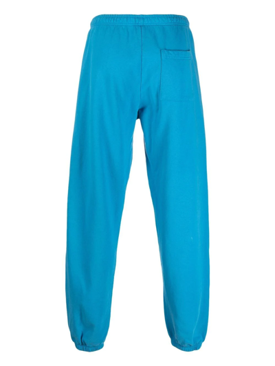 Shop Sporty And Rich Athletics Cotton Track Pants In 蓝色