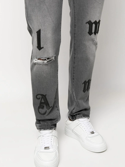 Shop Palm Angels Distressed Straight-leg Jeans In Grau