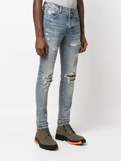 Shop Amiri Tartan-patch Ripped Skinny Jeans In Blue