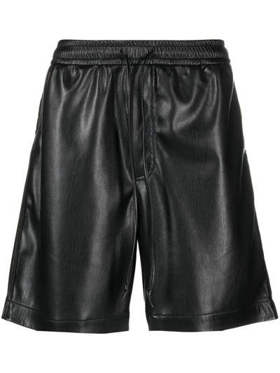 Shop Nanushka Doxxi Vegan Leather Bermuda Shorts In Black