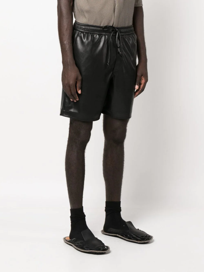 Shop Nanushka Doxxi Vegan Leather Bermuda Shorts In Black