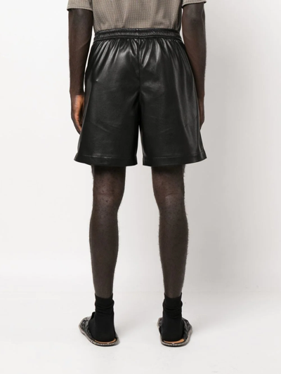 Shop Nanushka Doxxi Vegan Leather Bermuda Shorts In Black