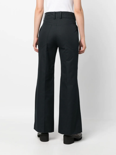 Shop Patou High-waisted Flared Trousers In Blue