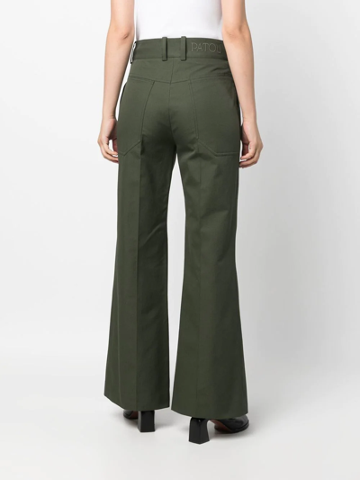 Patou Logo-embroidered Flared Trousers In Green