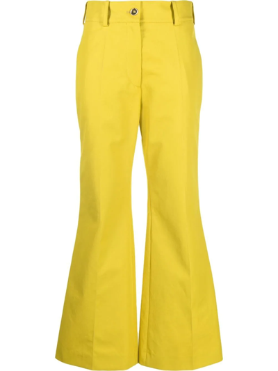 Shop Patou Logo-embroidered Flared Trousers In Yellow