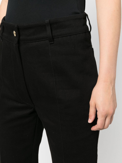 Patou High-waisted Flared Trousers In Black