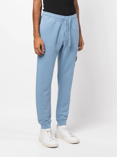 Shop Stone Island Compass Patch Track Pants In Blue