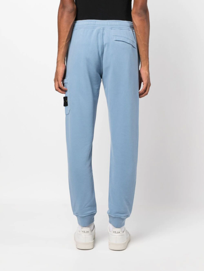 Shop Stone Island Compass Patch Track Pants In Blue