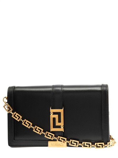 Shop Versace Black And Gold Greca Goddes Shoulder Bag Woman