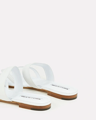 Shop Manolo Blahnik Susa Leather Flat Sandals In White