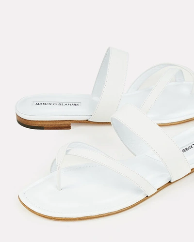 Shop Manolo Blahnik Susa Leather Flat Sandals In White